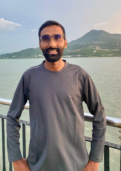 Qasim Hussain photographed beside the Tamsui river estuary in northern Taiwan.
